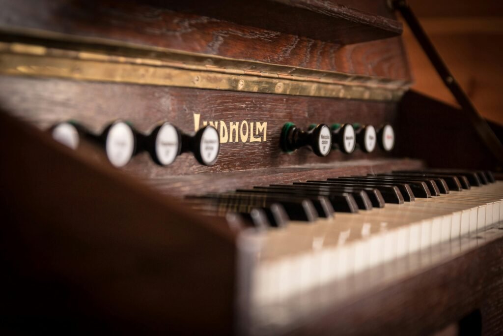 Close-up of vintage Lindholm piano keys capturing the essence of classic musical instruments.
